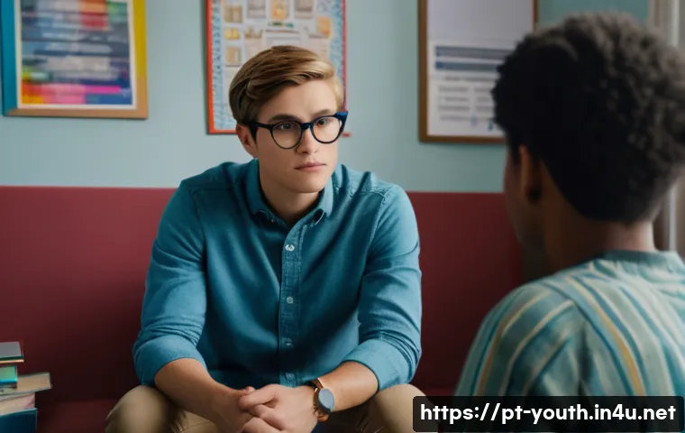 청소년상담사 상담사례 분석을 위한 가이드 - A compassionate school counselor attentively listening to a teenage boy wearing casual clothes and g...